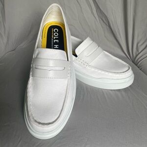 Cole Haan white loafers. Never been worn.